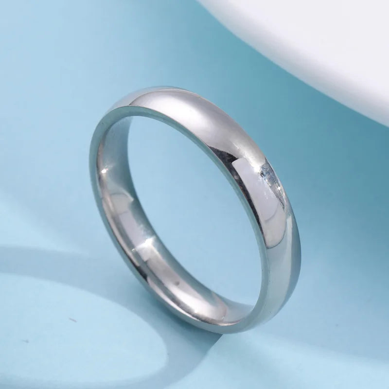 Simple Chic Stainless Steel Rings - Elevate Your Style! Perfect for couples, weddings, and engagements. Timeless design for both men and women. Order now! خاتم من الفولاذ المقاوم للصدأ بتصميم بسيط وأنيق للنساء والرجال - مثالي للأزياء! مناسب للأزواج